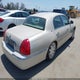 1LNHM83W83Y697800 2003 Lincoln Town Car Cartier auction photo thumbnail 4