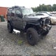 1C4HJXDN2KW542263 2019 Jeep Wrangler Unlimited Sport S 4X4 auction photo thumbnail 1