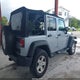 1C4HJWDG5GL118029 2016 Jeep Wrangler Unlimited Sport auction photo thumbnail 4