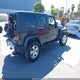 1J4BA5H18AL123409 2010 Jeep Wrangler Unlimited Sahara auction photo thumbnail 4
