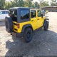 1C4BJWDG0FL640653 2015 Jeep Wrangler Unlimited Sport auction photo thumbnail 4