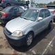 1HGEJ8547XL037764 1999 Honda Civic Ex auction photo thumbnail 2