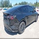 7SAYGDEE8PF947747 2023 Tesla Model Y Awd/Long Range Dual Motor All-Wheel Drive auction photo thumbnail 4