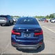 WBA13BK06NCJ01700 2022 BMW M550Xi auction photo thumbnail 14