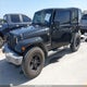 1C4HJWEG0CL255047 2012 Jeep Wrangler Unlimited Sahara auction photo thumbnail 2