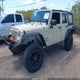 1J4BA3H11BL608593 2011 Jeep Wrangler Unlimited Sport auction photo thumbnail 2