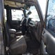1C4HJWDG7EL259603 2014 Jeep Wrangler Unlimited Sport auction photo thumbnail 5