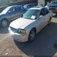1LNHM87A9YY897476 2000 Lincoln Ls V8 Auto auction photo thumbnail 2