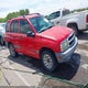 2CNBJ134346918005 2004 Chevrolet Tracker auction photo thumbnail 1