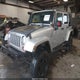 1J4GA59179L770285 2009 Jeep Wrangler Unlimited Sahara auction photo thumbnail 2