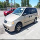 2HKRL18501H610649 2001 Honda Odyssey Lx auction photo thumbnail 2