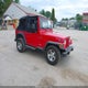 1J4FA29P6YP767898 2000 Jeep Wrangler Se auction photo thumbnail 1