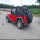 1J4FA29P6YP767898 2000 Jeep Wrangler Se auction photo thumbnail 3