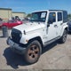1C4BJWEG5GL291523 2016 Jeep Wrangler Unlimited Sahara auction photo thumbnail 2