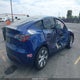 7SAYGDEE4PA146570 2023 Tesla Model Y Awd/Long Range Dual Motor All-Wheel Drive auction photo thumbnail 4