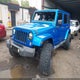 1C4HJWEG9EL206951 2014 Jeep Wrangler Unlimited Polar Edition auction photo thumbnail 2