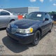 1LNHM82W0XY639283 1999 Lincoln Town Car Signature auction photo thumbnail 2