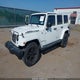 1C4HJWEG0HL709871 2017 Jeep Wrangler Unlimited Smoky Mountain 4X4 auction photo thumbnail 2