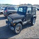 1J4FA59S02P703627 2002 Jeep Wrangler Sahara auction photo thumbnail 2