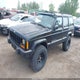 1J4FF48S2YL190863 2000 Jeep Cherokee Sport auction photo thumbnail 2