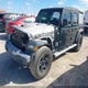 1C4HJXDG4KW561799 2019 Jeep Wrangler Unlimited Sport 4X4 auction photo thumbnail 2