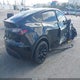 7SAYGDEE4PA136783 2023 Tesla Model Y Awd/Long Range Dual Motor All-Wheel Drive auction photo thumbnail 4