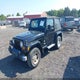 1J4FA59S23P328003 2003 Jeep Wrangler Sahara auction photo thumbnail 2