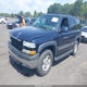 1GNEK13Z44J333129 2004 Chevrolet Tahoe Lt auction photo thumbnail 2