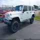 1C4HJWEG7EL272964 2014 Jeep Wrangler Unlimited Sahara auction photo thumbnail 2
