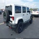 1C4HJWEG7EL272964 2014 Jeep Wrangler Unlimited Sahara auction photo thumbnail 4
