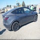 7SAYGDEE1PF900768 2023 Tesla Model Y Awd/Long Range Dual Motor All-Wheel Drive auction photo thumbnail 4