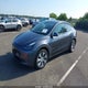 7SAYGDEE8PA168409 2023 Tesla Model Y Awd/Long Range Dual Motor All-Wheel Drive auction photo thumbnail 2