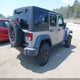 1C4BJWDG2GL283588 2016 Jeep Wrangler Unlimited Willys Wheeler auction photo thumbnail 4
