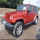 1J4GA59199L751267 2009 Jeep Wrangler Unlimited Sahara auction photo thumbnail 2