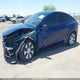 7SAYGDEE8PA106671 2023 Tesla Model Y Awd/Long Range Dual Motor All-Wheel Drive auction photo thumbnail 2
