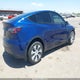 7SAYGDEE8PA106671 2023 Tesla Model Y Awd/Long Range Dual Motor All-Wheel Drive auction photo thumbnail 4