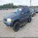 1J4GW58N52C132497 2002 Jeep Grand Cherokee Limited auction photo thumbnail 2