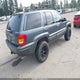 1J4GW58N52C132497 2002 Jeep Grand Cherokee Limited auction photo thumbnail 4