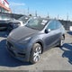 7SAYGAEE0PF869737 2023 Tesla Model Y Awd/Long Range Dual Motor All-Wheel Drive auction photo thumbnail 2
