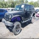 1C4HJWEG3EL142048 2014 Jeep Wrangler Unlimited Sahara auction photo thumbnail 2