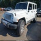 1C4HJWEG3FL509810 2015 Jeep Wrangler Unlimited Sahara auction photo thumbnail 2