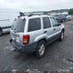 1J8GW48N03C612263 2003 Jeep Grand Cherokee Laredo auction photo thumbnail 4