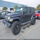1C4HJXEG3JW320961 2018 Jeep Wrangler Unlimited Sahara 4X4 auction photo thumbnail 2