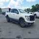1N6AA1E69JN549461 2018 Nissan Titan Platinum Reserve auction photo thumbnail 1