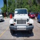 1J4HA5H19AL220208 2010 Jeep Wrangler Unlimited Sahara auction photo thumbnail 12