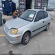 KMHCF35C33U276858 2003 Hyundai Accent auction photo thumbnail 2