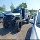 1C4HJXENXMW670526 2021 Jeep Wrangler Unlimited Sahara Altitude 4X4 auction photo thumbnail 2