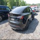 7SAYGDEE5PA166004 2023 Tesla Model Y Awd/Long Range Dual Motor All-Wheel Drive auction photo thumbnail 4