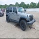 1C4BJWDG0FL556123 2015 Jeep Wrangler Unlimited Sport auction photo thumbnail 1