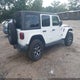 1C4HJXFG9MW714239 2021 Jeep Wrangler Unlimited Rubicon 4X4 auction photo thumbnail 4